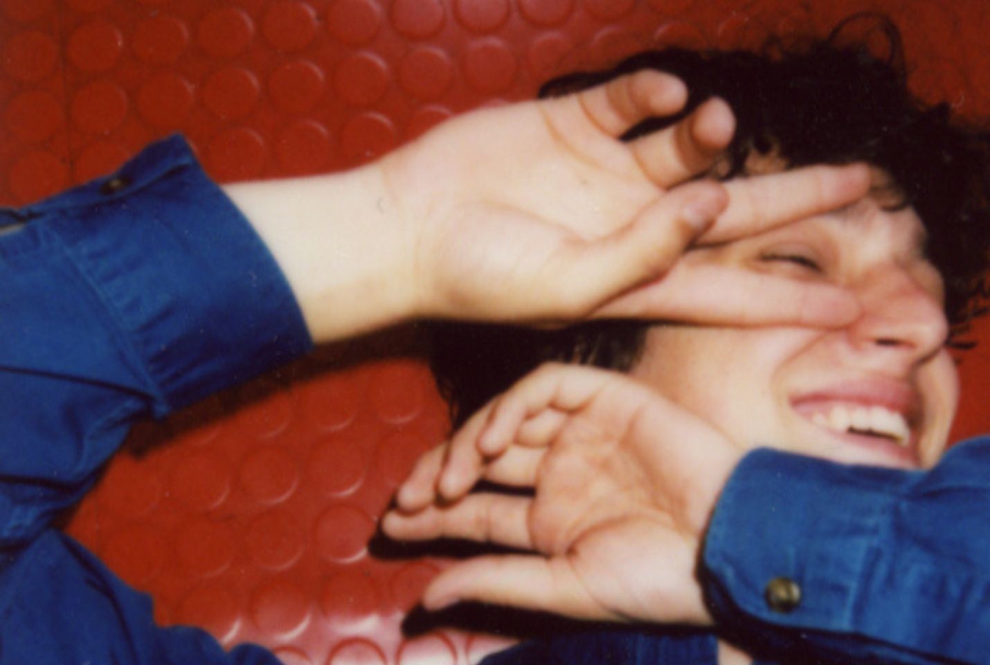 Marti Perramon with his hands over the side of his face