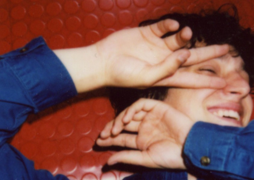 Marti Perramon with his hands over the side of his facex