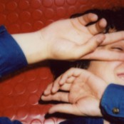 Marti Perramon with his hands over the side of his face