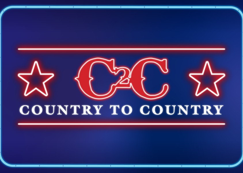 A blue background with the Country to Country Festival Logo in the centre in neon red with stars on each side