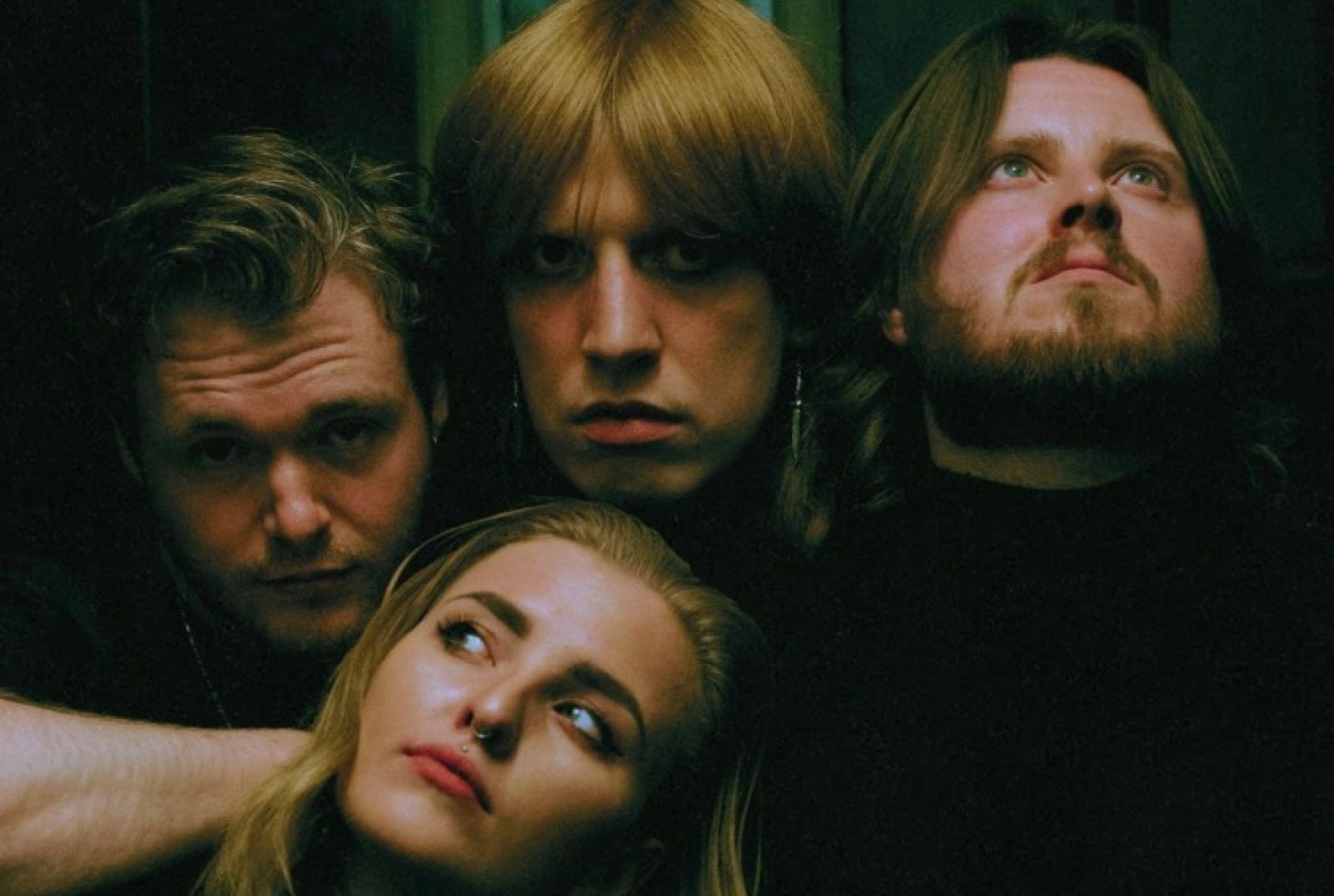 Mercy Girl members, Daisy Miles, Davey Purdie, Craig Harkness and Kyle MacNaughton looking into the distance.