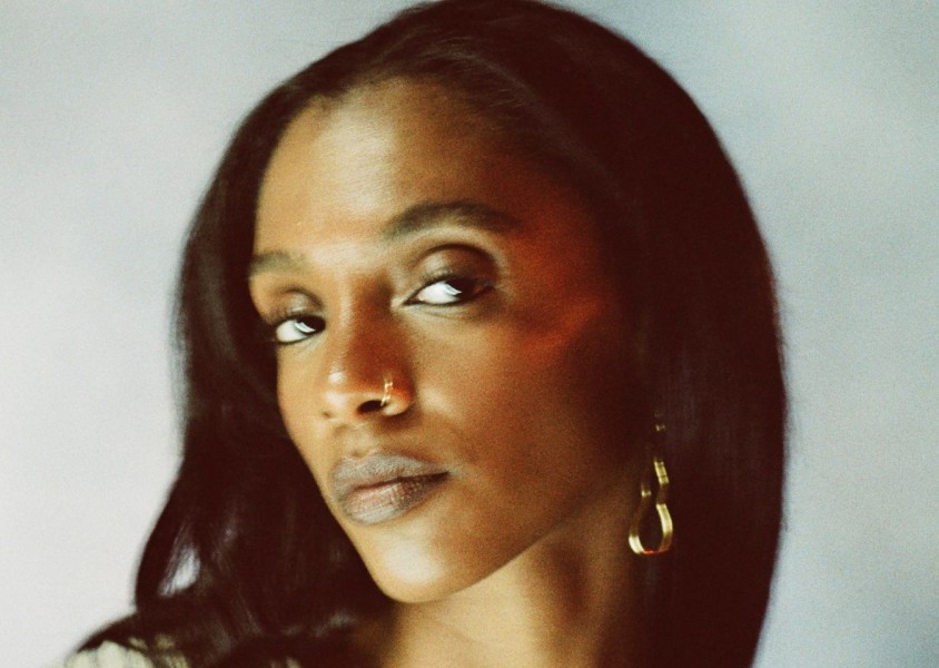 Mereba smiling into the camera.x