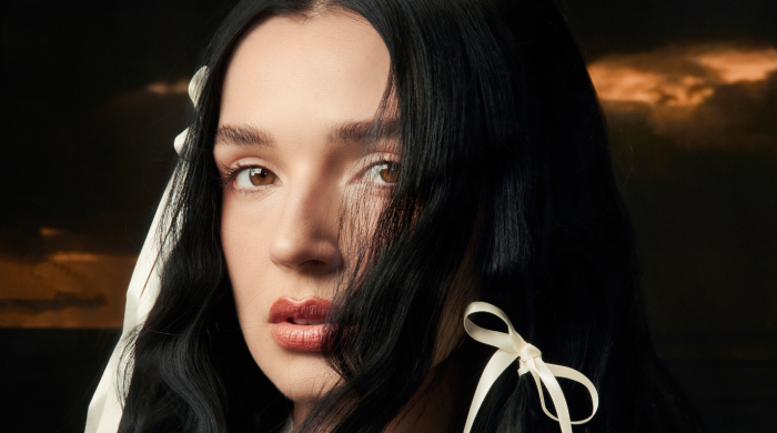 Artist Poppy with bows in hair