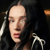 Artist Poppy with bows in hair
