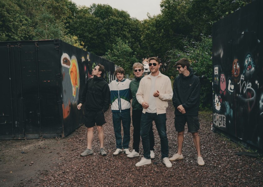 5 men posing outdoors x
