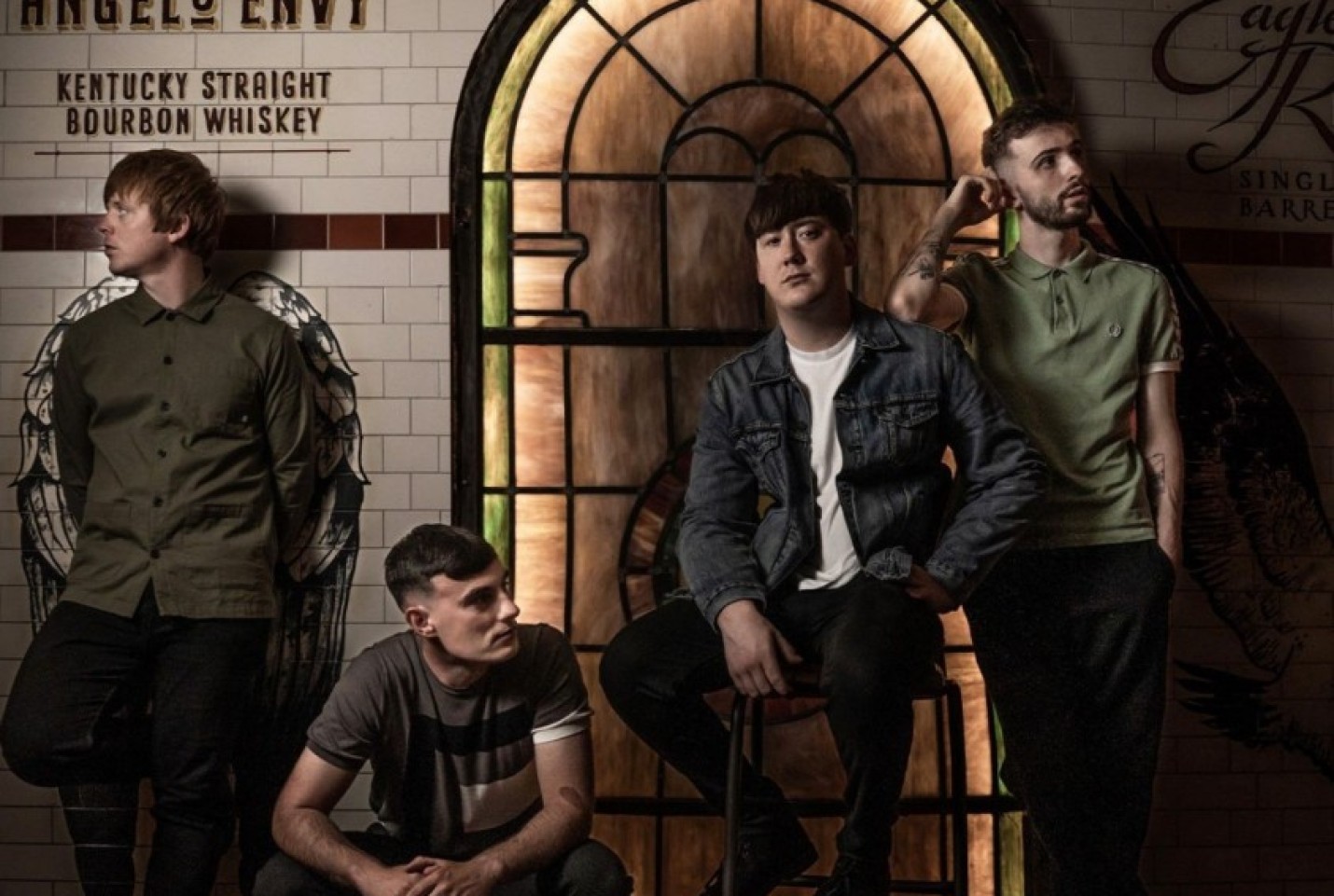 The band the k's with members, Ryan Breslin, Jexter Baker and Nathan Peers looking into the distance with Jamie Boyle looking at the camera.