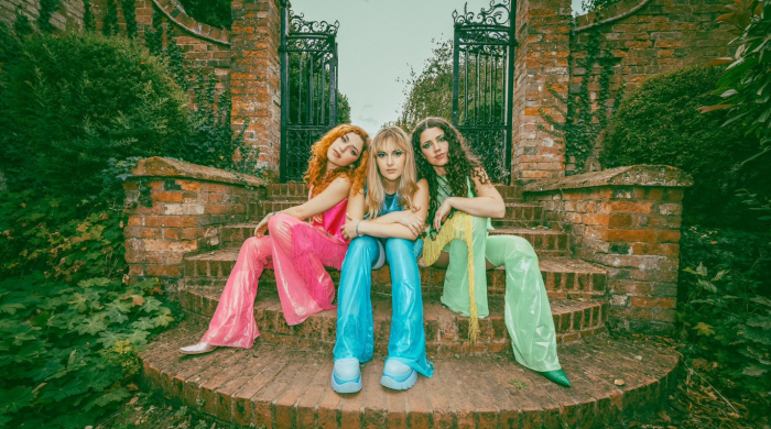 Artist Trousdale sitting on steps 