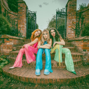 Artist Trousdale sitting on steps 